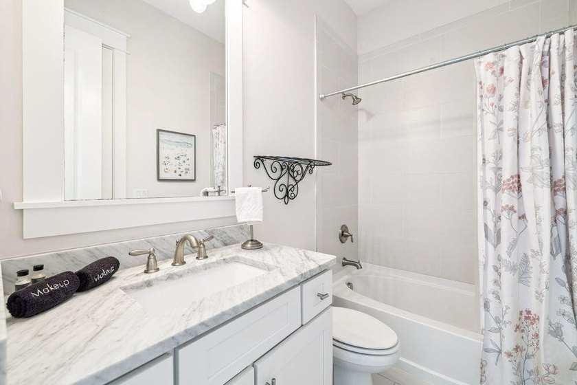 Classic coastal design meets relaxed 30A living in this - photo 22