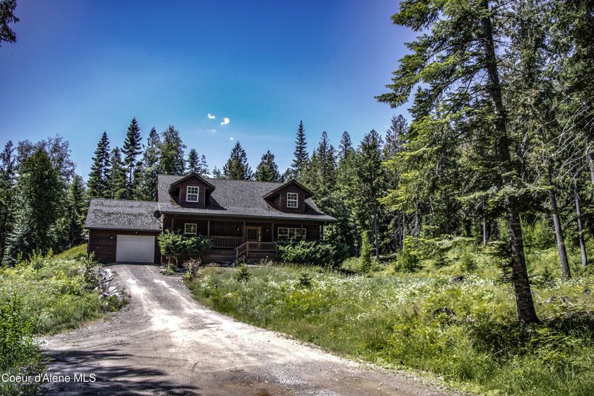 Privately sited on 5 acres with a beautiful mix of trees and - photo 42