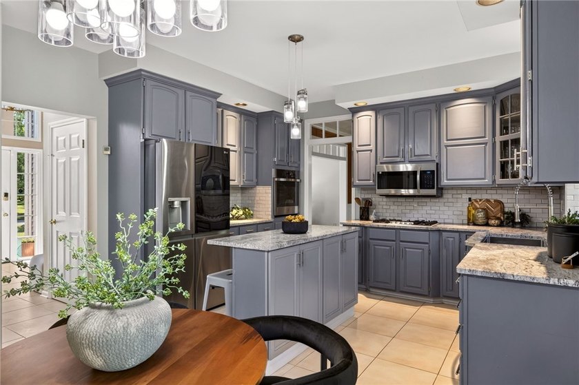 Set on nearly half an acre in a sought-after Penfield - photo 11