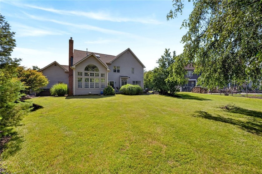 Set on nearly half an acre in a sought-after Penfield - photo 34