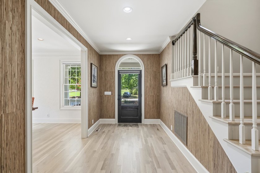 Nestled within the coveted Parkside enclave of Cuscowilla on - photo 9