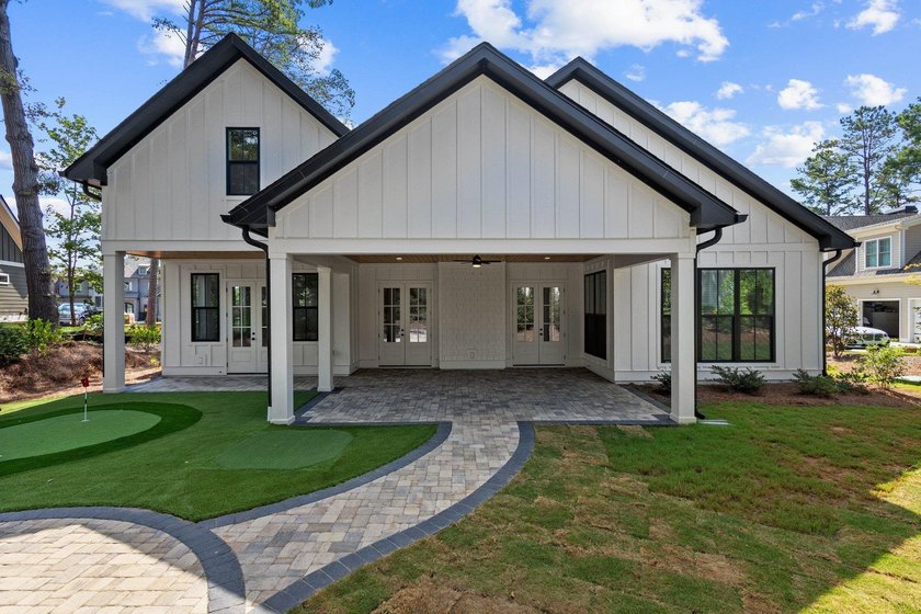 Nestled in the heart of Cuscowilla on Lake Oconee, this - photo 6
