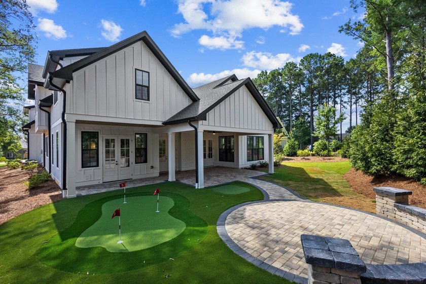 Nestled in the heart of Cuscowilla on Lake Oconee, this - photo 7