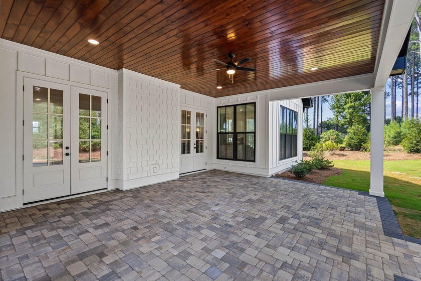 Nestled in the heart of Cuscowilla on Lake Oconee, this - photo 9