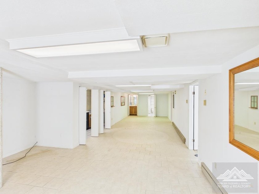 Welcome to this spacious and well maintained brick ranch home - photo 34