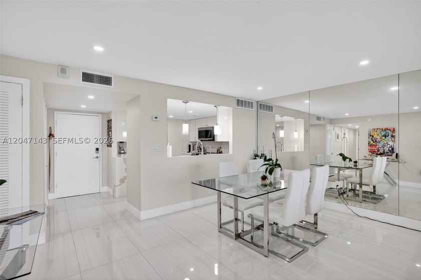 Mesmerizing views from this FULLY RENOVATED corner unit with - photo 17