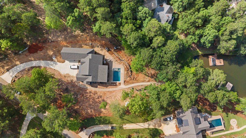 The Hearth is a waterfront home designed around the moments that - photo 10