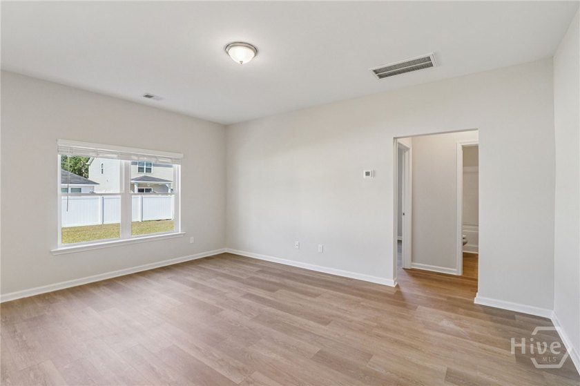 The Magnolia floorplan by Smith Family Homes is under - photo 12