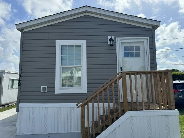Make your new home in Palm Haven SP, a well-maintained - photo 2