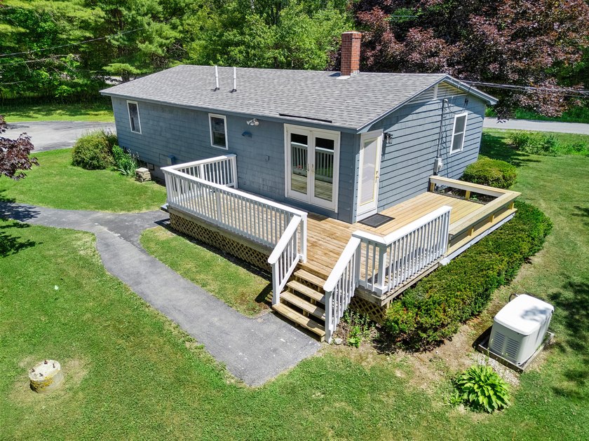 This charming and beautifully updated 3-bedroom home offers - photo 3