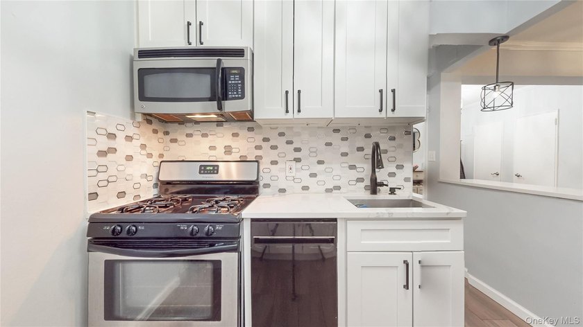 Welcome home to this charming Jr 4, 2-bedroom residence offering - photo 9