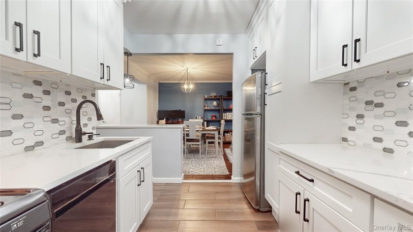 Welcome home to this charming Jr 4, 2-bedroom residence offering - photo 10