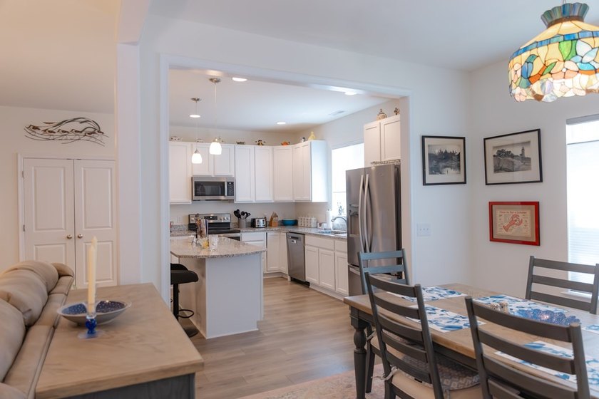 This beautiful home with a .37-acre wooded lot is located on a - photo 3