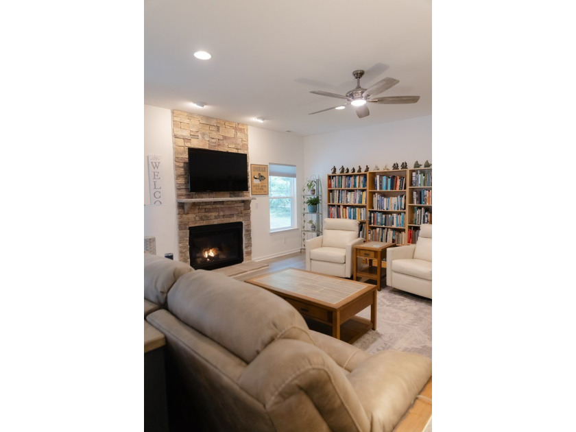 This beautiful home with a .37-acre wooded lot is located on a - photo 9