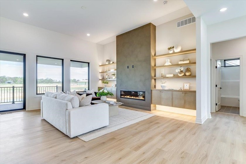 MODEL IS NOW FOR SALE! Welcome home to this stunning new floor - photo 4