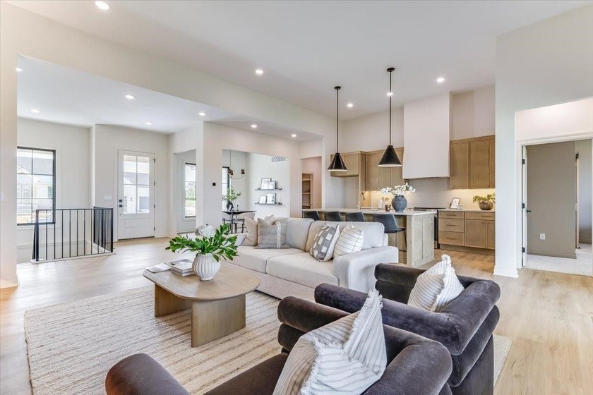 MODEL IS NOW FOR SALE! Welcome home to this stunning new floor - photo 5