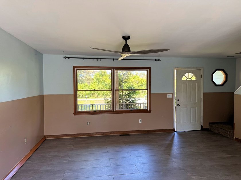 3-bedroom, 1.5 bath duplex unit with attached garage. This unit - photo 3