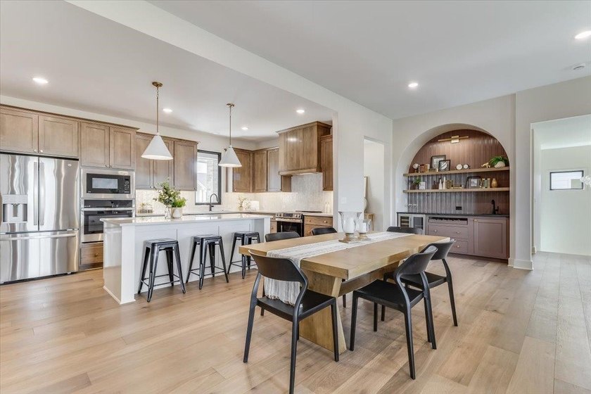 MODEL IS NOW FOR SALE! Stunning 5 Bedroom, 3 Bath Lakefront Home - photo 8