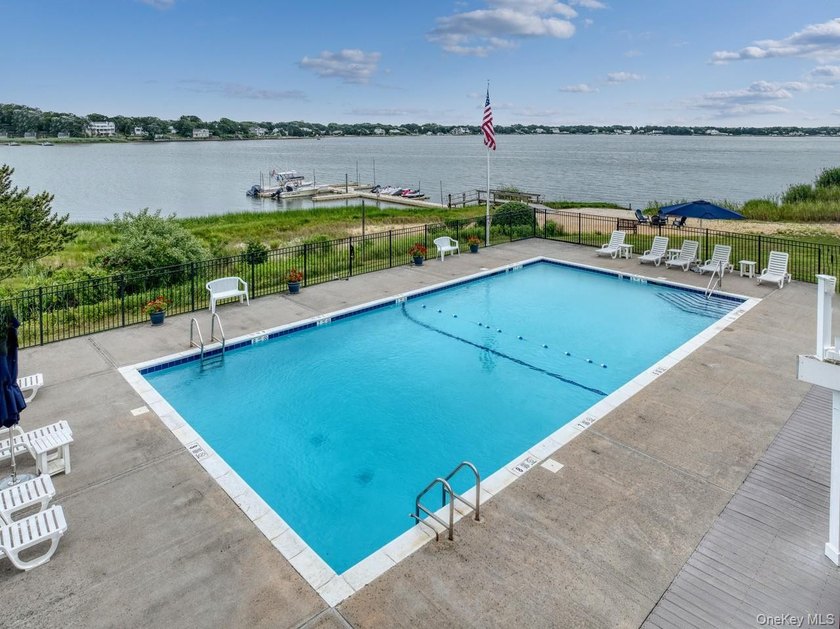 This sun-drenched 2-bedroom, 1-bath waterfront co-op is one - photo 9