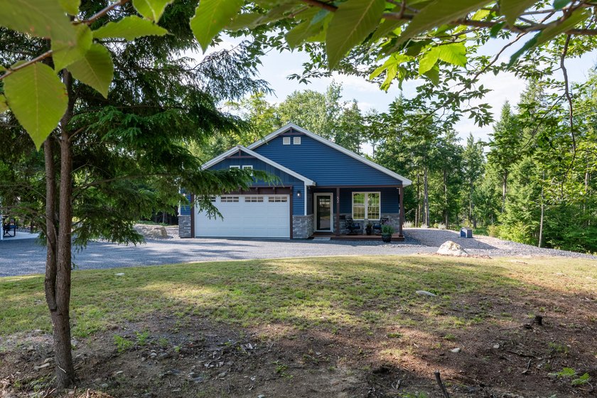 Discover 52 East Shore Road, where year-round recreation and the - photo 2
