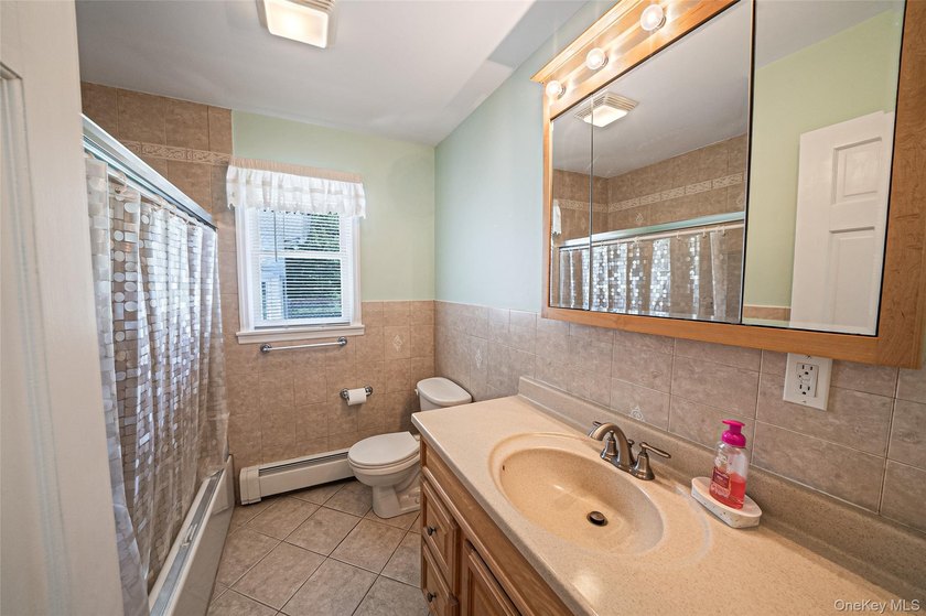 Welcome to 376 South Country Road, where space, comfort, and - photo 17