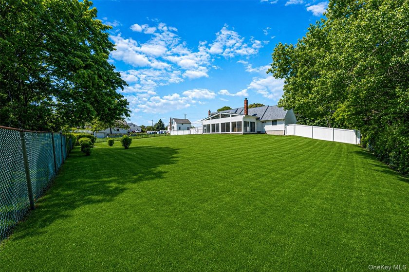 Welcome to 376 South Country Road, where space, comfort, and - photo 32