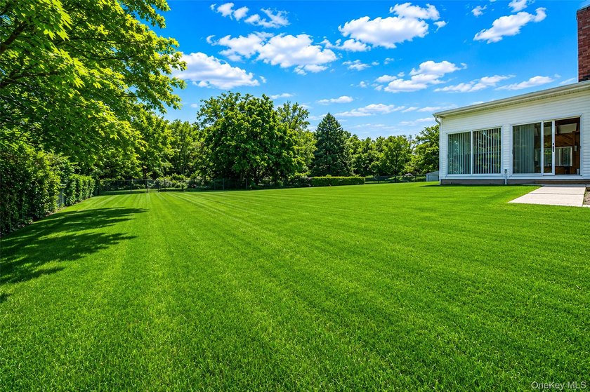 Welcome to 376 South Country Road, where space, comfort, and - photo 33