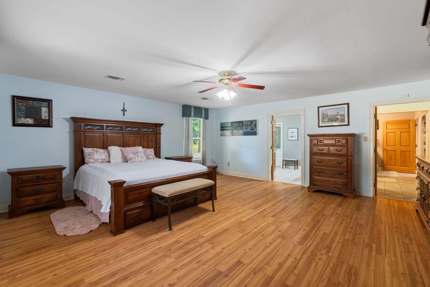 Enjoy morning coffee in your sunroom overlooking the private - photo 11