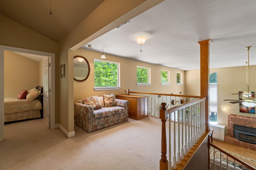 Enjoy morning coffee in your sunroom overlooking the private - photo 15