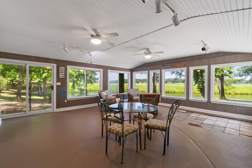 Enjoy morning coffee in your sunroom overlooking the private - photo 24