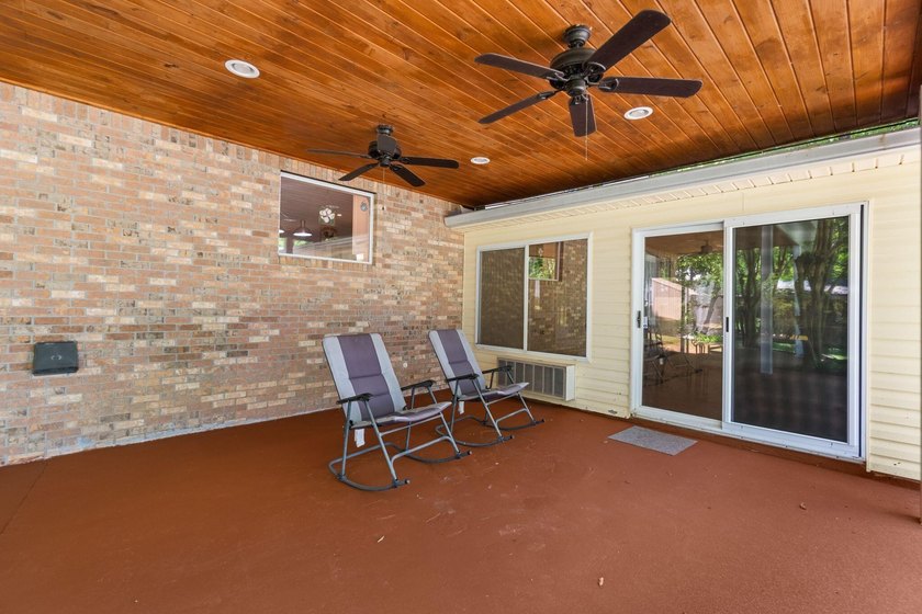 Enjoy morning coffee in your sunroom overlooking the private - photo 26