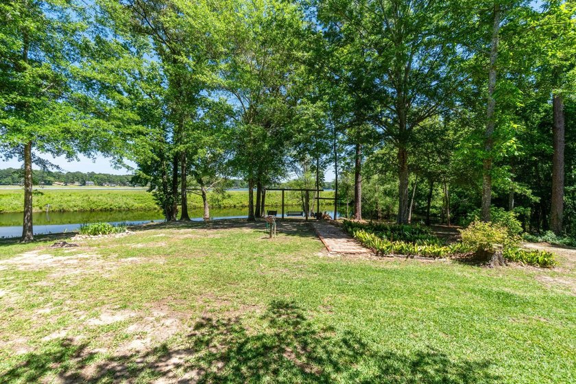 Enjoy morning coffee in your sunroom overlooking the private - photo 28