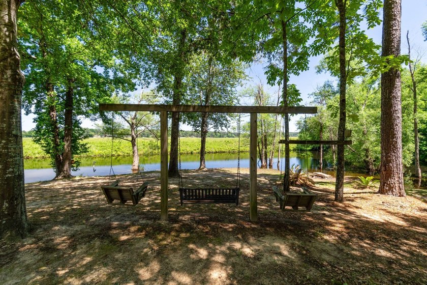 Enjoy morning coffee in your sunroom overlooking the private - photo 29