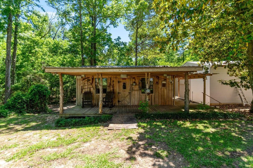 Enjoy morning coffee in your sunroom overlooking the private - photo 32