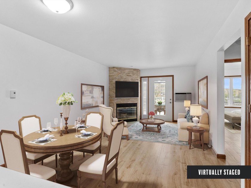 Discover this beautifully renovated second-floor condo featuring - photo 2