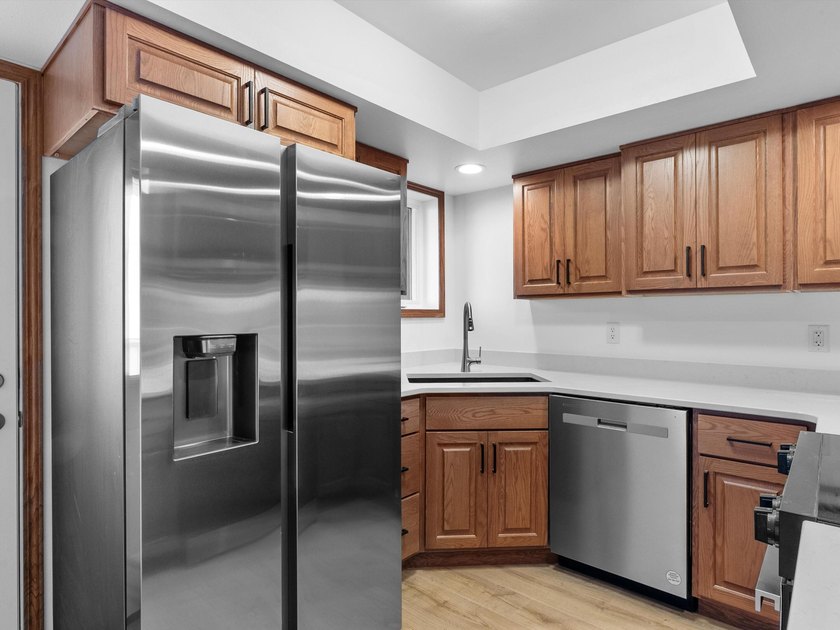 Discover this beautifully renovated second-floor condo featuring - photo 7