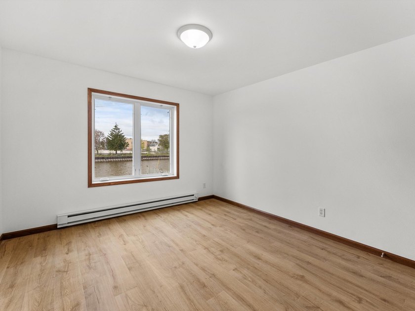 Discover this beautifully renovated second-floor condo featuring - photo 10