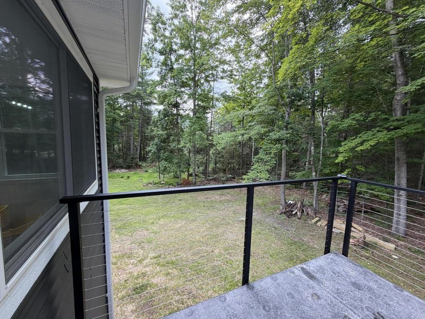 Beautifully renovated 4-bedroom, 2.5-bath home on 1.38 acres - photo 6