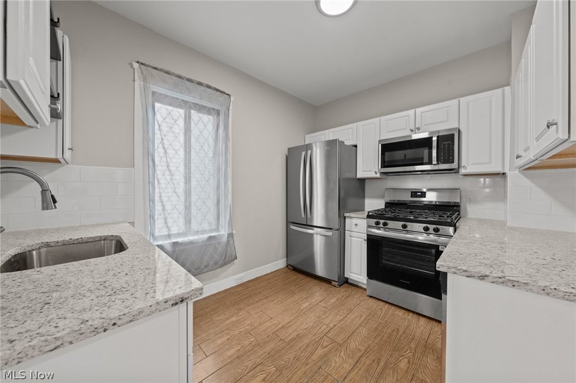 Welcome to this beautifully renovated, move-in-ready 5-bedroom - photo 15