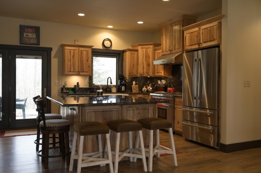 Amazing custom built home on 40 wooded acres near White Lake in - photo 11