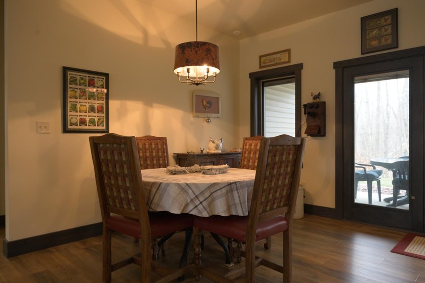 Amazing custom built home on 40 wooded acres near White Lake in - photo 15