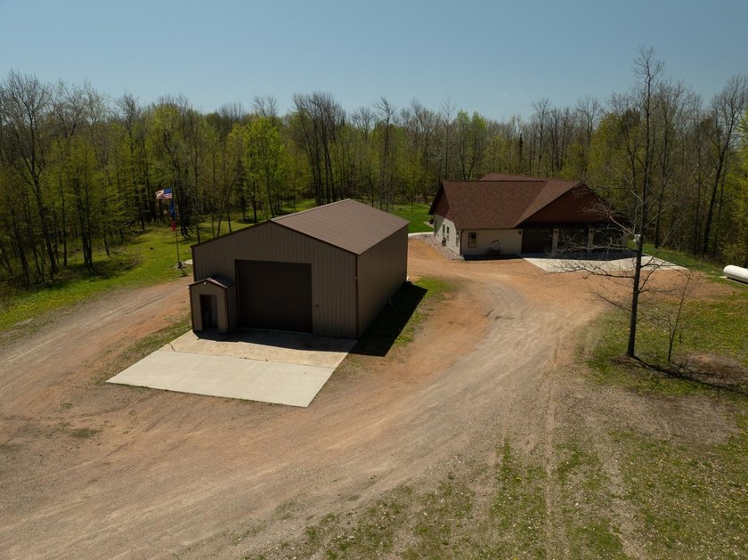 Amazing custom built home on 40 wooded acres near White Lake in - photo 41