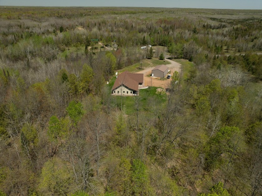 Amazing custom built home on 40 wooded acres near White Lake in - photo 48