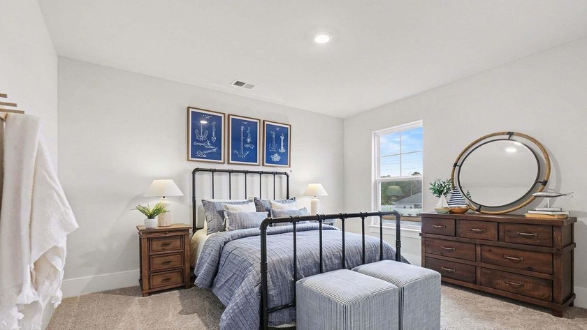 *4 bedrooms, 2.5 baths *Welcoming front porch and screened in - photo 18