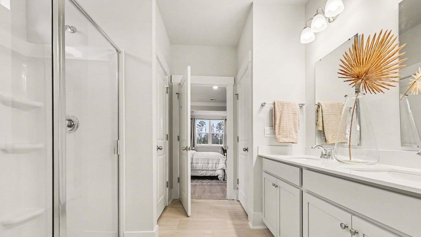 *4 bedrooms, 2.5 baths *Welcoming front porch and screened in - photo 23
