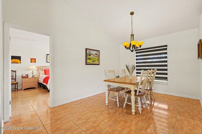 OWNER MOTIVATED! . This inviting property features an open floor - photo 6