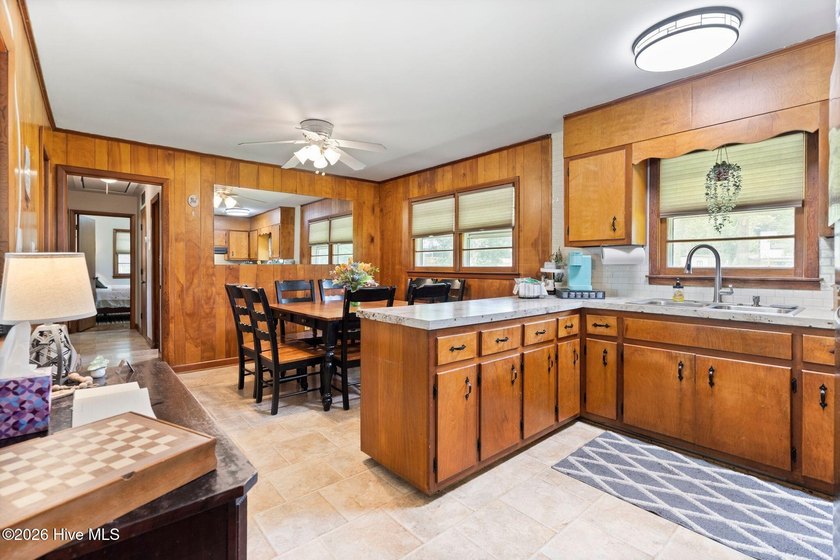Charming, well-maintained brick home situated on a rare .79-acre - photo 12