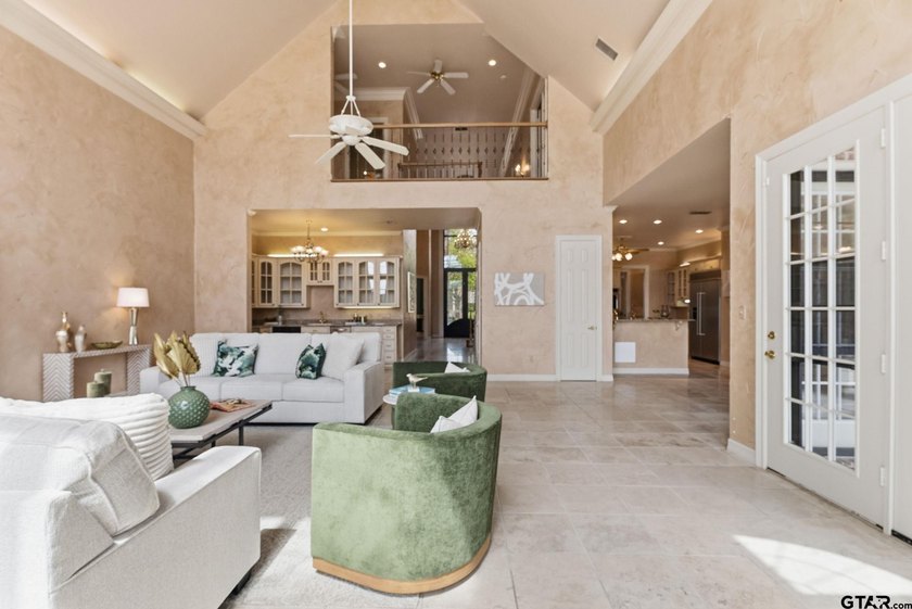This extraordinary estate is located in the gated community of - photo 12