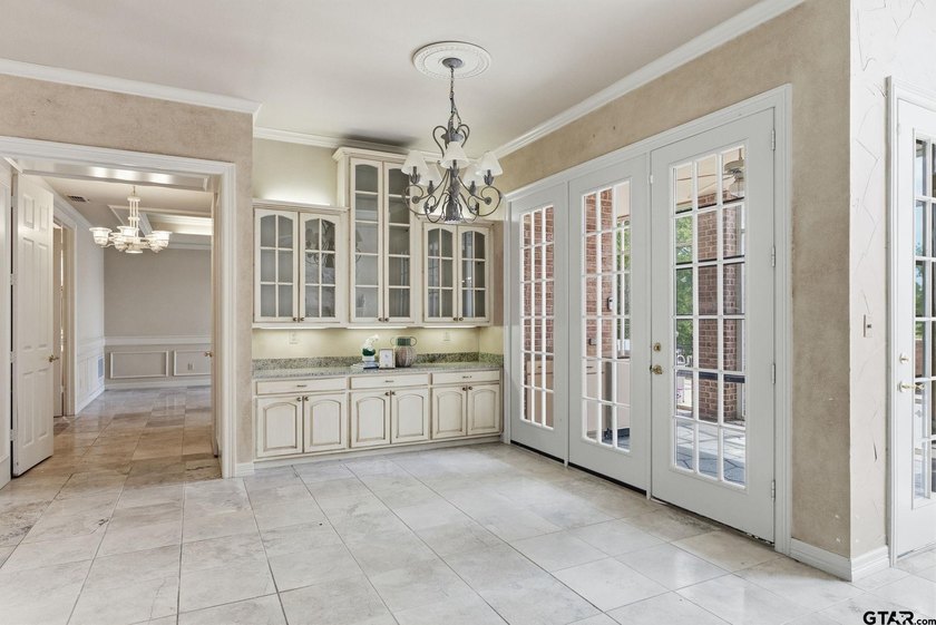 This extraordinary estate is located in the gated community of - photo 17
