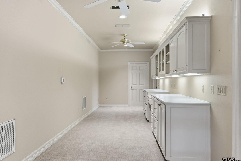 This extraordinary estate is located in the gated community of - photo 31